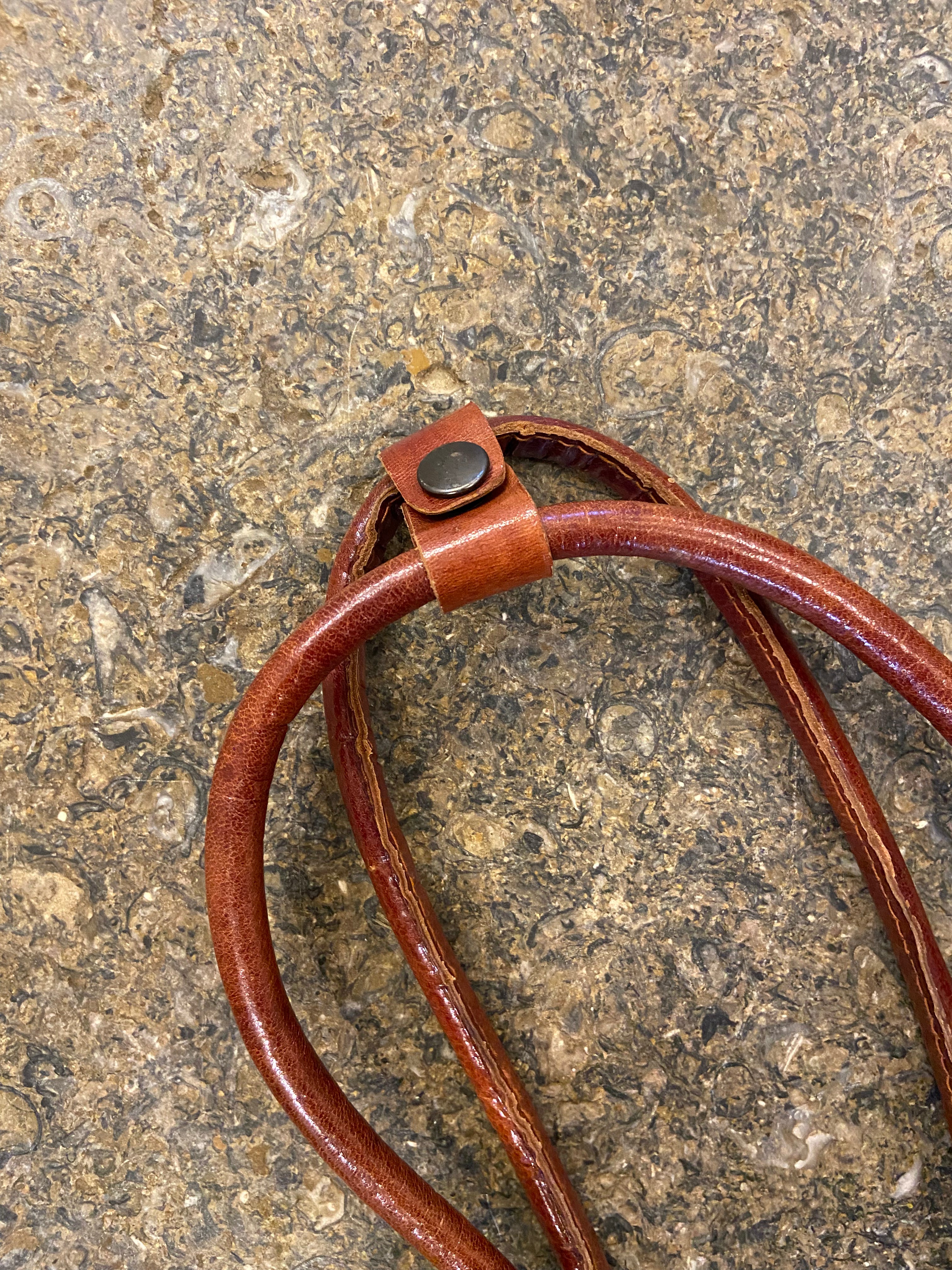 Brown leather swirl pattern shoulder bag