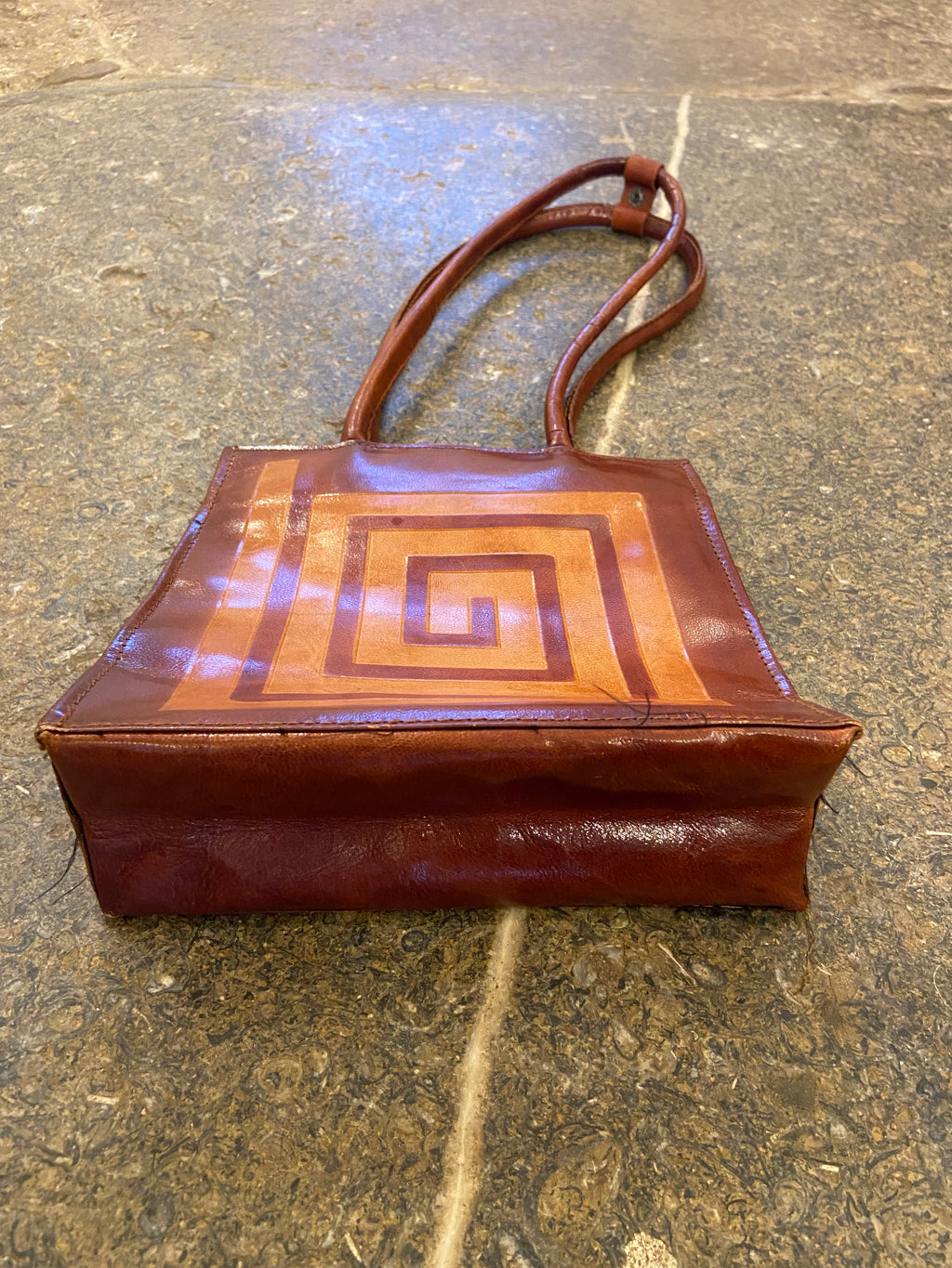 Brown leather swirl pattern shoulder bag